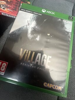 Xbox One X 1TB + 9 her - 10