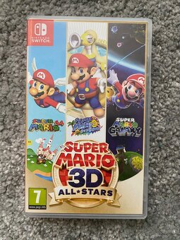 Nintendo Switch + Hry - 10