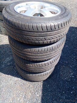 Alu kola 5x100, ET 43 vč. pneu 195/65 R 15 - 10