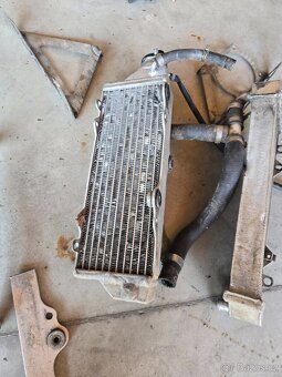 Chladiče a držáky Husqvarna 125 - 10
