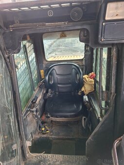 NEW HOLLAND LS 180 - 10