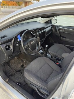 Toyota Corolla 1.6 i,  97kw - 10