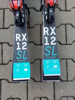 DODATEČNÁ SLEVA - Žákovské závodní lyže Kästle - GS a SL - 10