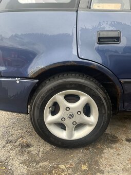 Suzuki Swift 1.3 GLX 63kw - 10
