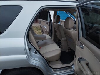 Kia Sportage 2.0 benzín 4x4-KOUP.ČR, CEBIE, PO SERVISU - 10
