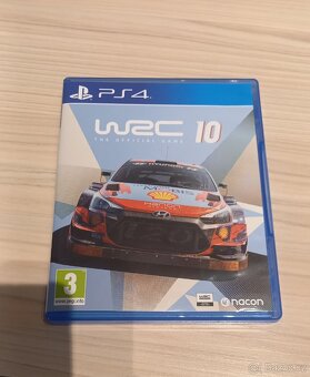 Playstation 4 Pro + 9 her - 10