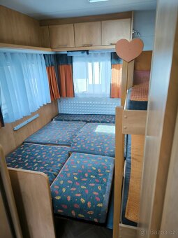 Rodinný karavan Burstner 480 Sportiv - palandy - 10