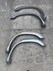 Nissan Patrol Y61 Plastové lemy , zadní nárazník , výztuha - 10