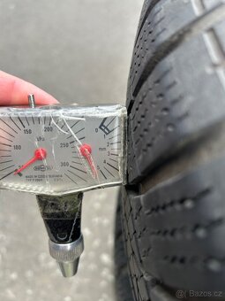 Zimní pneu 215/55/R16/97H včetně disku + poklice - 10