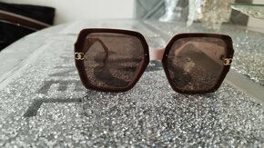 Brýle sluneční a sluchátka - 10