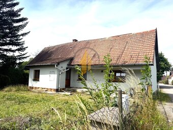Prodej rodinného domu se zahradou a stavebním pozemkem v obc - 10