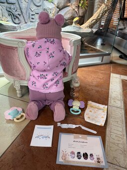 Realistická Reborm panenka v zimní bundičce - 10