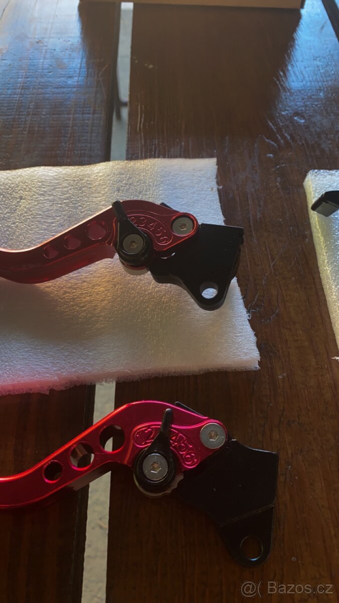 Držák na mobil,závažíčka do řídítek ,páčky - 11