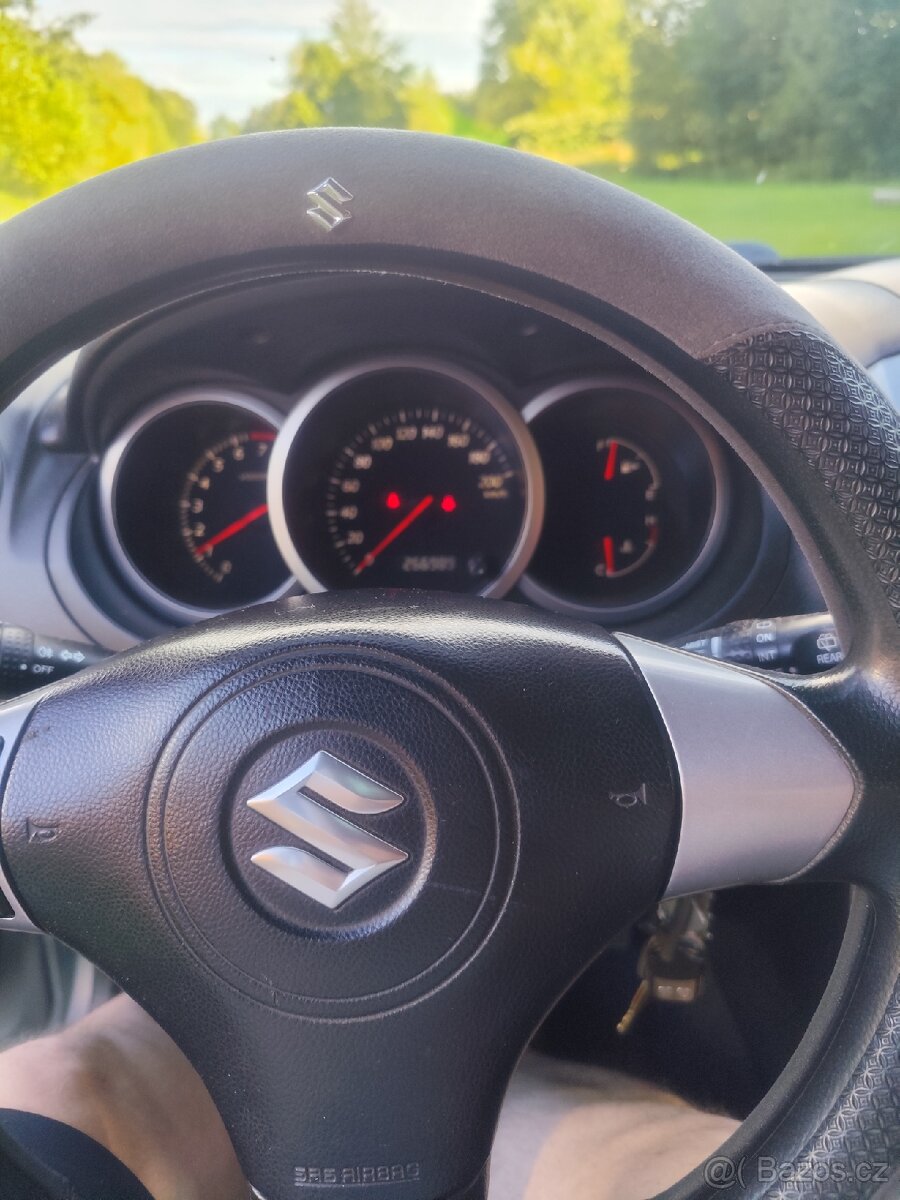 Suzuki grand Vitara 2l. Benzín 103kw 2006 - 11