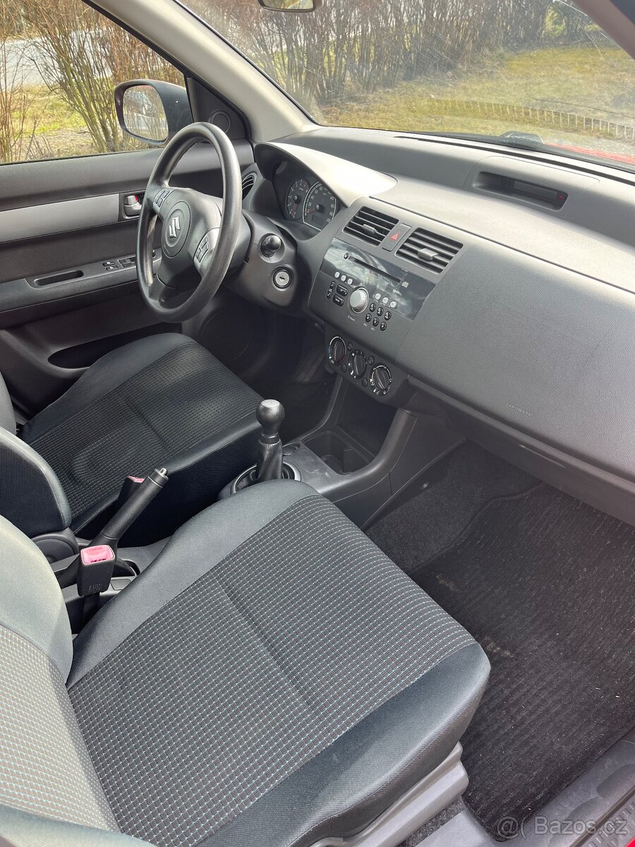 Suzuki Swift 1.3 - 11
