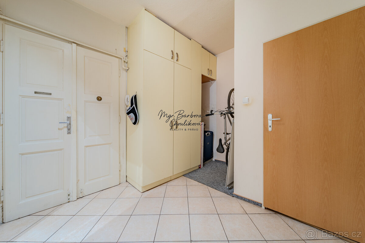 Prodej krásného bytu 2+kk s předzahrádkou a zahradou v ul. E - 11