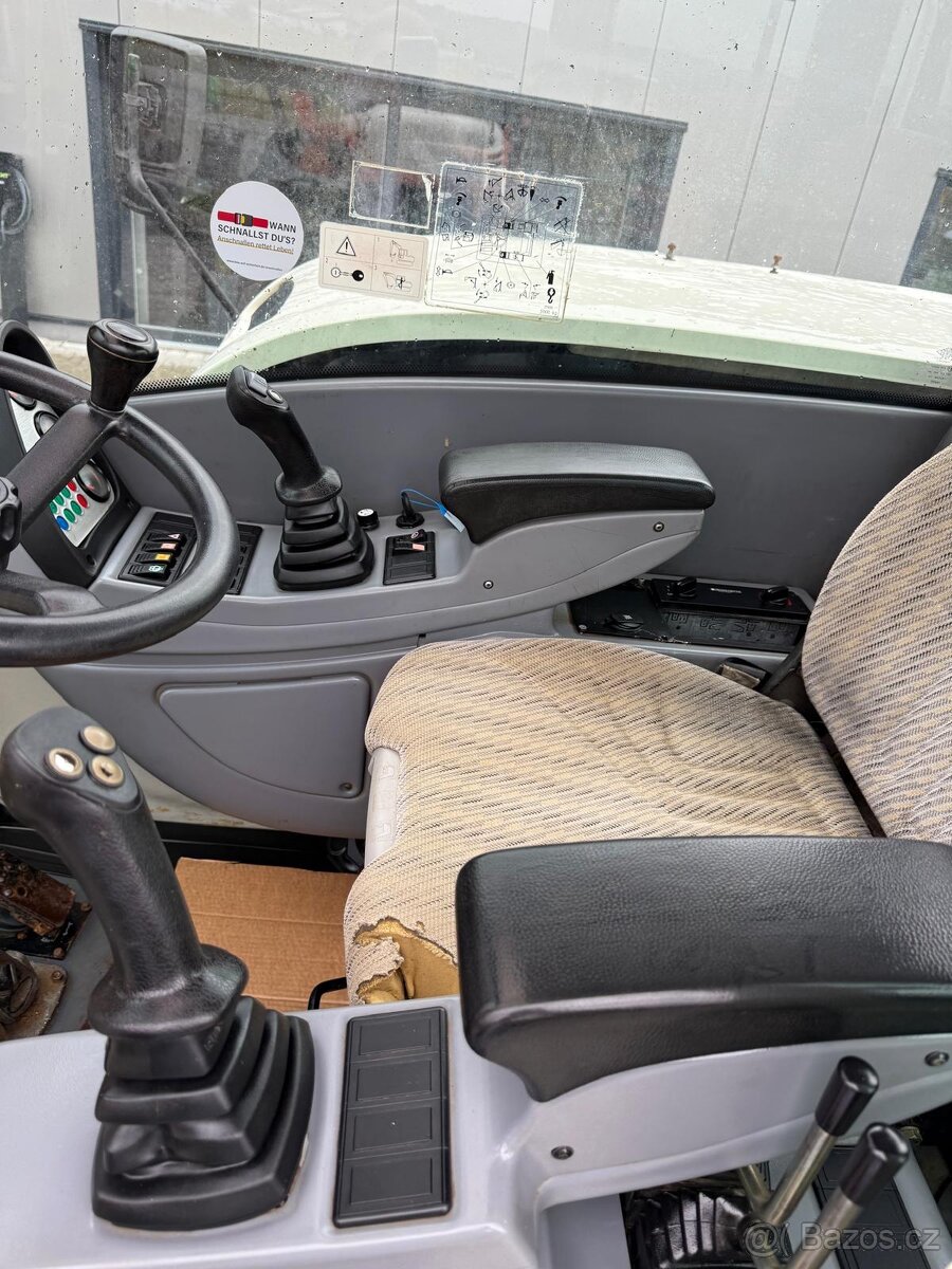 Kolový otočný bagr TEREX TW 110 - 11