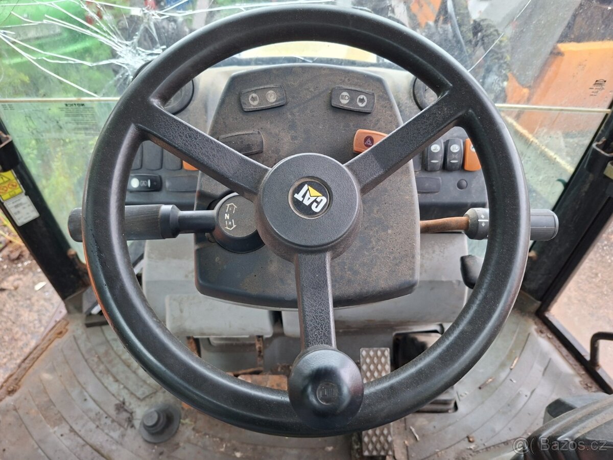 CATERPILLAR 428 E - 11