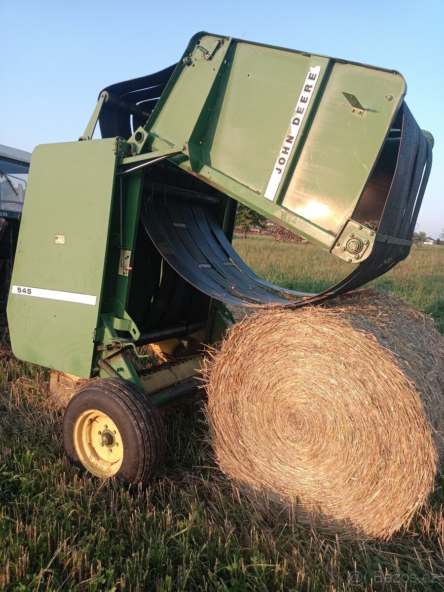 Svinovací lis JOHN DEERE 545 - 11