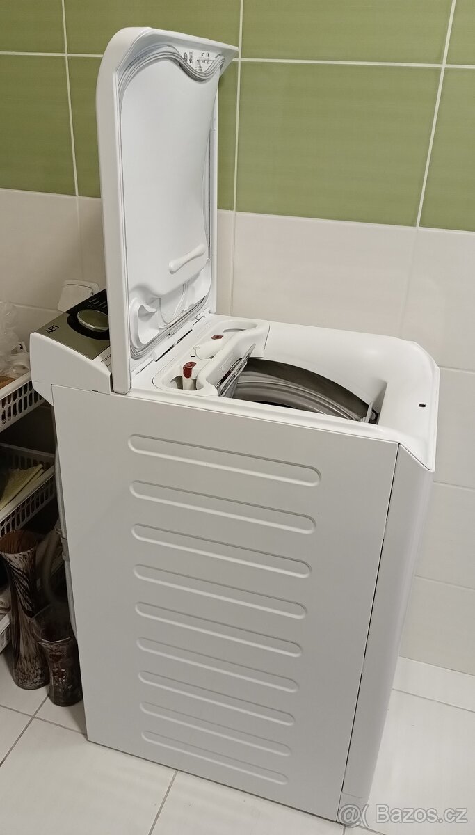 Pračka AEG s vrchním plněním a párou - 11