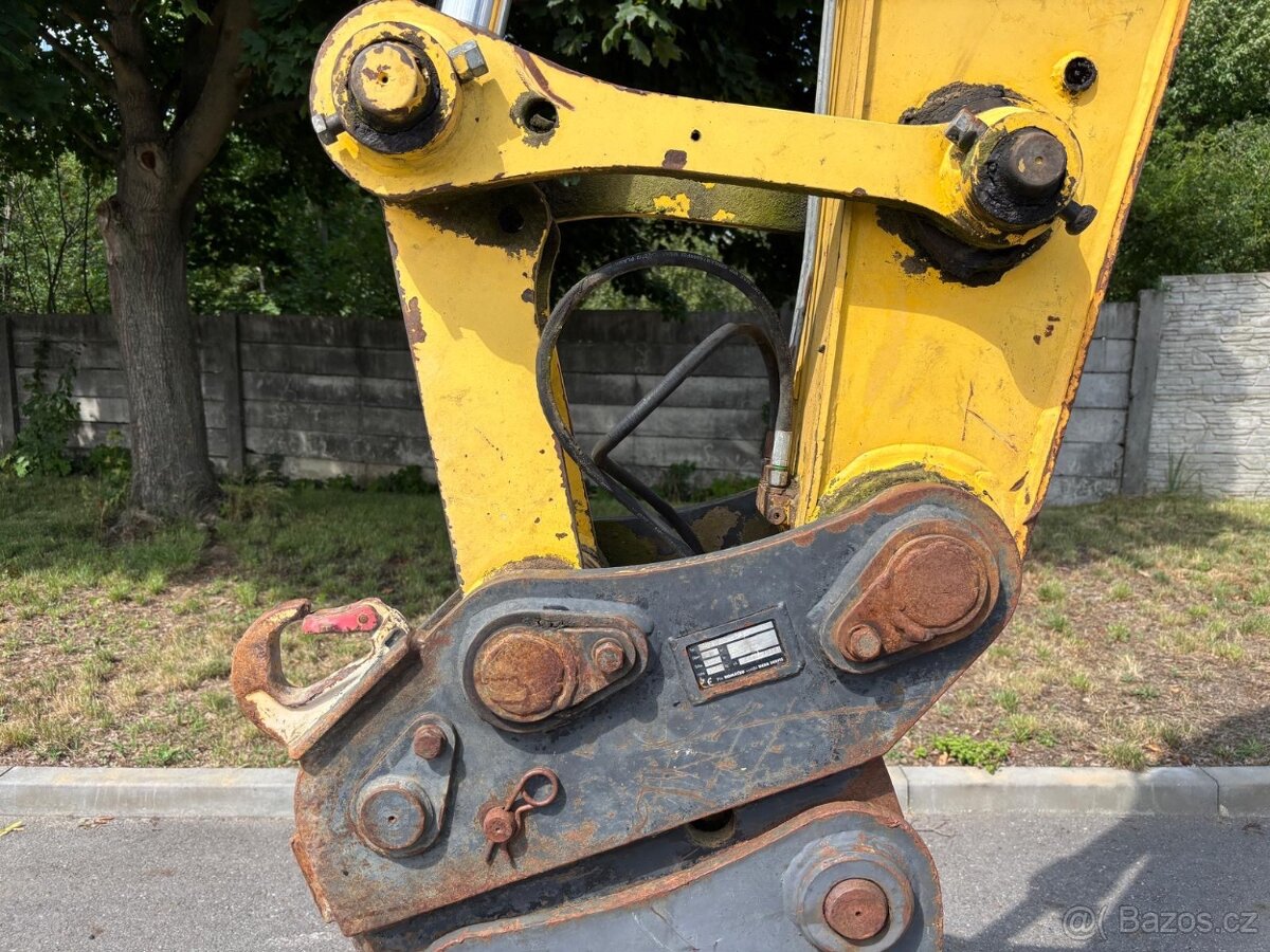 Kolové rypadlo / nakladač New Holland MH CITY - 11