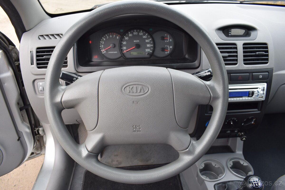Kia Rio 1,3i SUPER STAV,PO SERVISU - 11