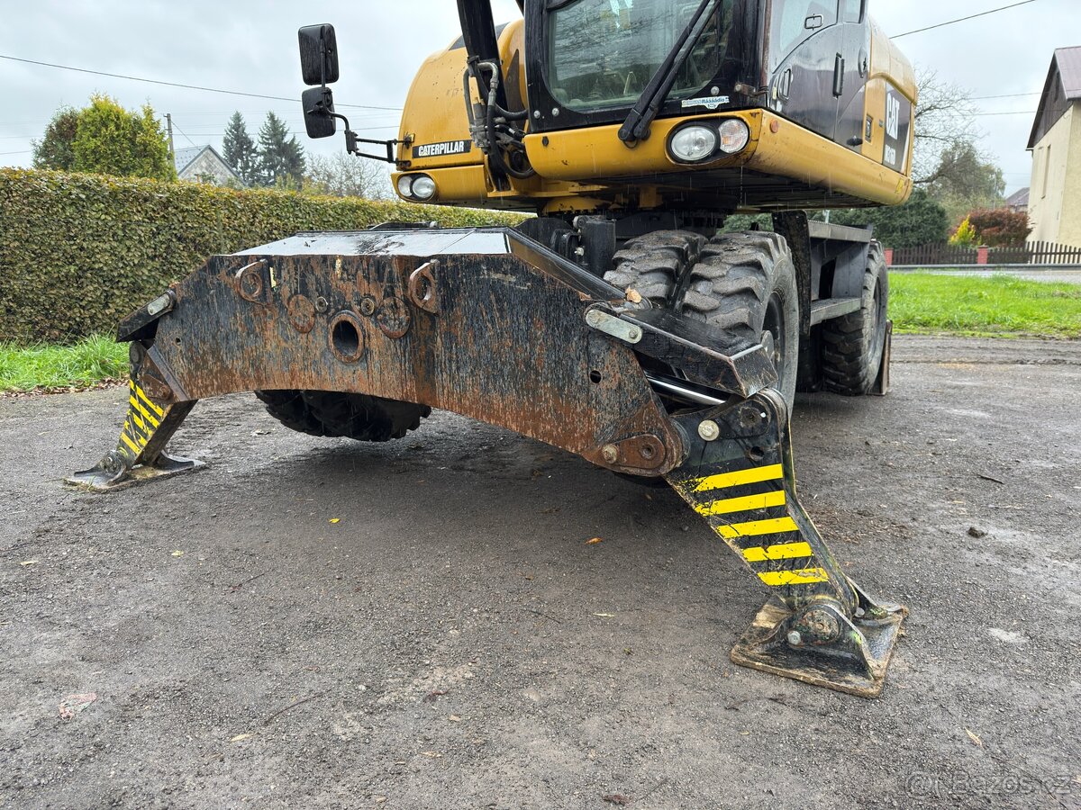 Kolový rypadlo Caterpillar M316D - 11