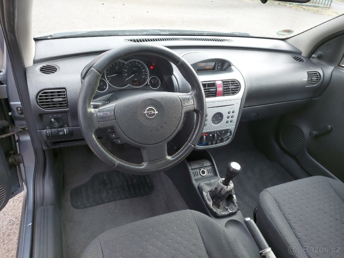 Opel Corsa 1.2i - 11