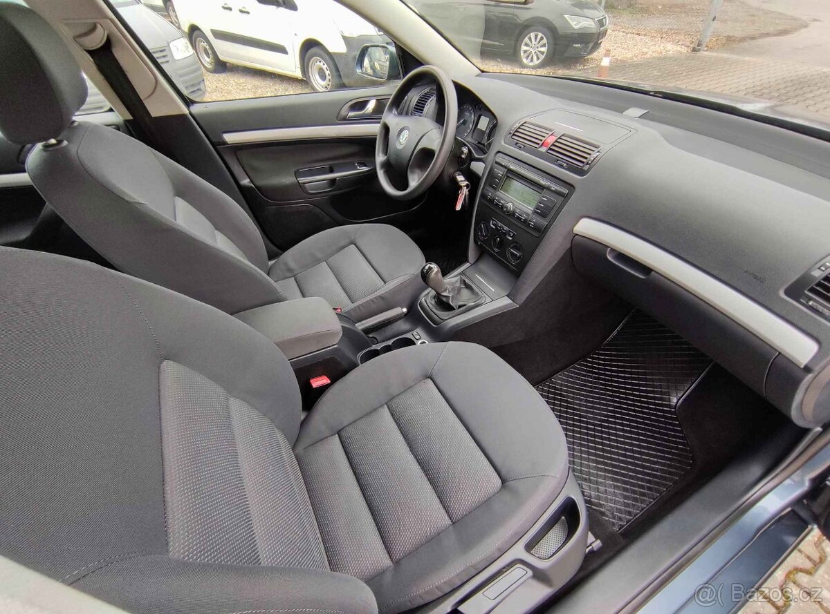 ŠKODA OCTAVIA II 1.6 MPi 75KW AMBIENTE,ALU,10x AIRB.,PDC,BC. - 11