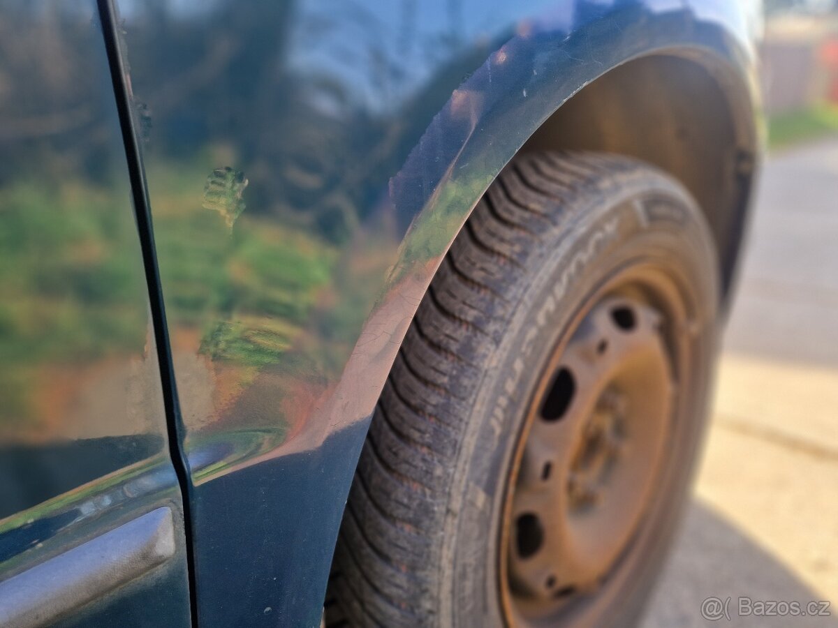 Škoda Fabia 1,4 - 11