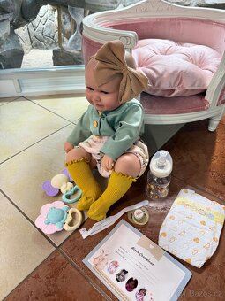 REALISTICKÁ PANENKA S ČELENKOU N.O.V.Á. - 11