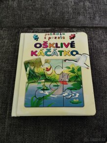 Puzzle"Medvídek PÚ"2x24, 1 knížka a dinosauři - 11