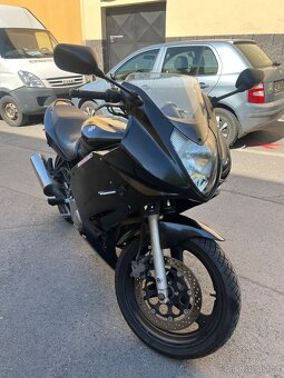 Sleva. Suzuki GS500 FU - 11
