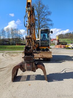 Kolovy bagr rypadlo liebherr 309 - 11