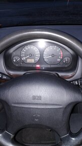 Carisma 1.6 benzín 66kw,rok98 - 11