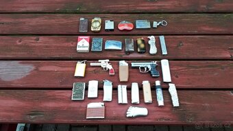 Stare zapalovače ,nůžky ,hodinky ,autíčka . - 11