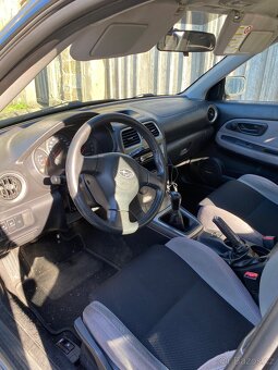 Subaru Impreza 2.0R 118 kW - 11