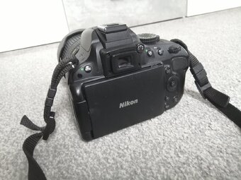 Nikon D5100 + 18-105 mm VR - 11