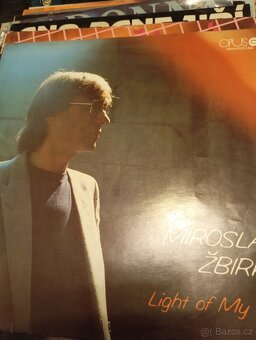 CD,Mc Lp a malý vinyl fota uvnitř - 11