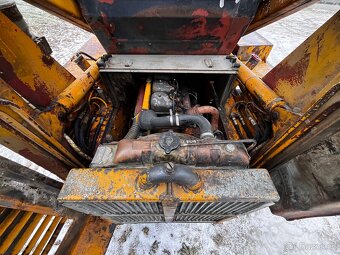 nakladač UNC 060 - 11