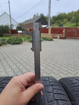 Zimní pneumatiky Nokian 205/55/16 s disky VW - 11