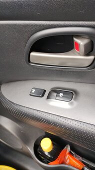 Kia Carens 2.0 CRDI - 11