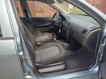Benzínová Škoda Fabia 1.4 FACELIFT - 11