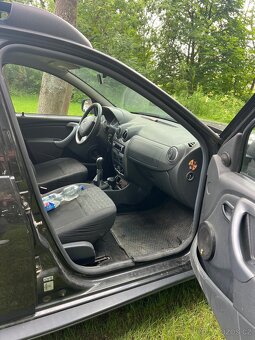 Dacia Duster,  1.6 i - 11