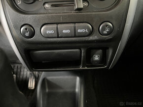 Suzuki Jimny 1.3 ALLGRIP Comfort - tažné,klima,vyh.sed,84 PS - 11