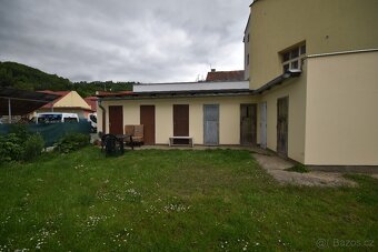 Prodej prostorného bytu 2+KK v cihlovém domě - 11
