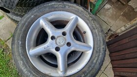 Prodám kola Ronal r14 4x100 185/60 R14 - 11