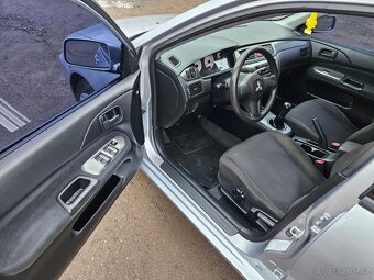 Mitsubishi Lancer, 1.6 - 11