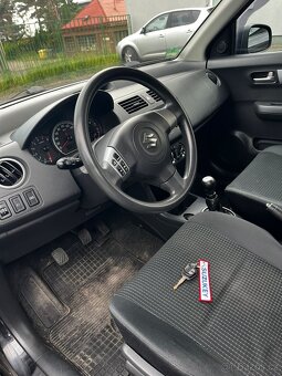 Suzuki Swift 1.3 67.5 kW TOP STAV - 11