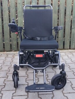 Skládací elektrický invalidní vozík. - 11